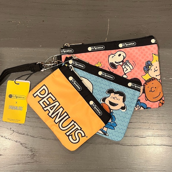 Lesportsac Handbags - NWT Lesportsac Peanuts Snoopy & Friends Pouch Bag Set